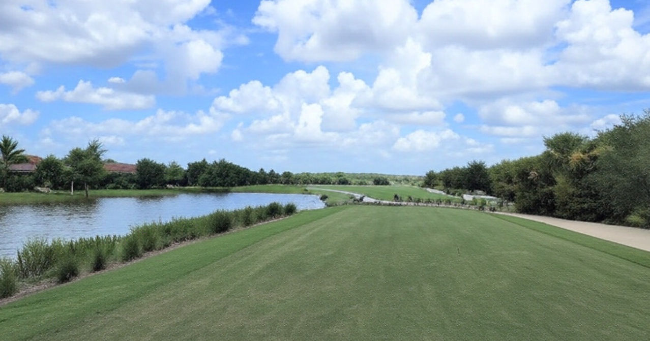 Bonita National Golf & Country Club in Florida fairway view with water on left side via Grok