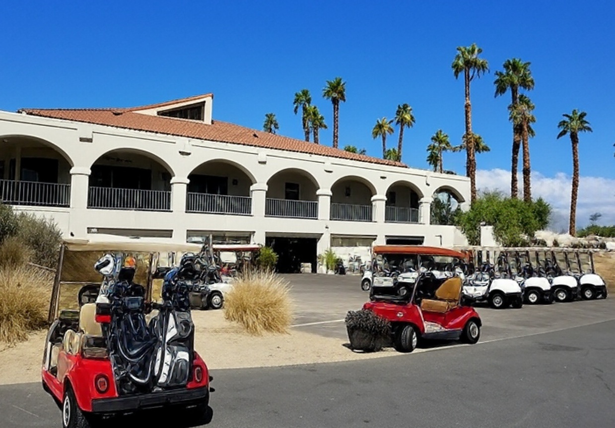 Palm Desert Resort Country Club in California view of clubhouse and golf carts via Grok